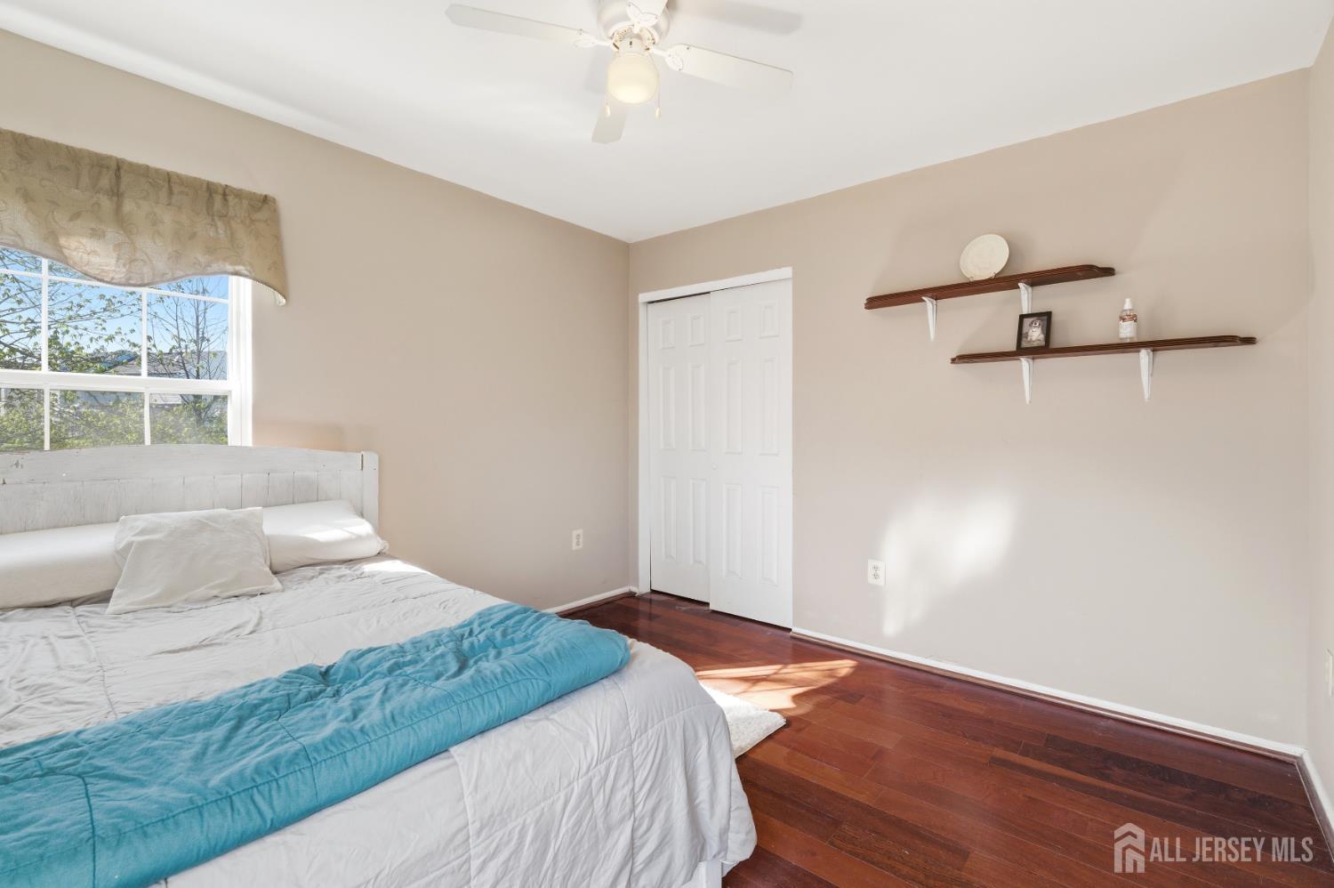 6 Shoshoni Way Somerville, NJ 08876 - Photo 28 of 52 a bedroom with a bed and a window