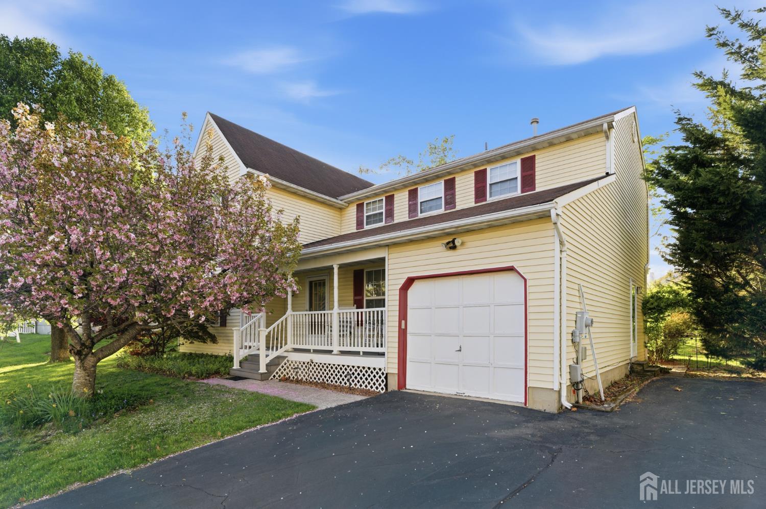 6 Shoshoni Way Somerville, NJ 08876 - Photo 3 of 52 a front view of a house with a yard