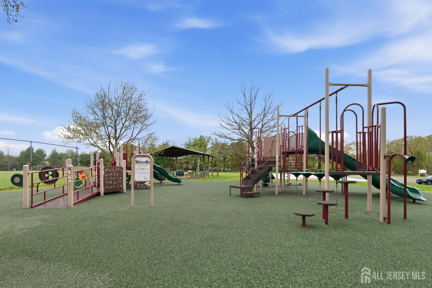 6 Shoshoni Way Somerville, NJ 08876 - Photo 49 of 52 a view of a park with swings and slides