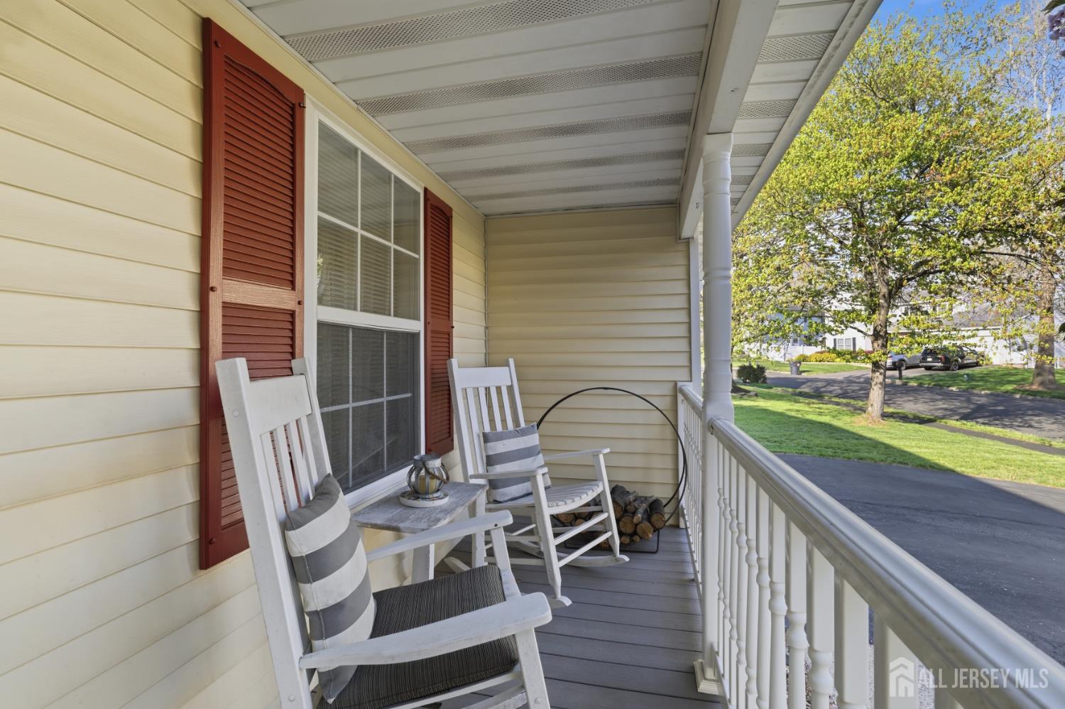 6 Shoshoni Way Somerville, NJ 08876 - Photo 7 of 52 a balcony with wooden floor and outdoor seating
