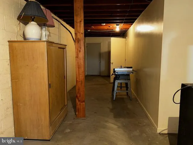 a view of a hallway with a room