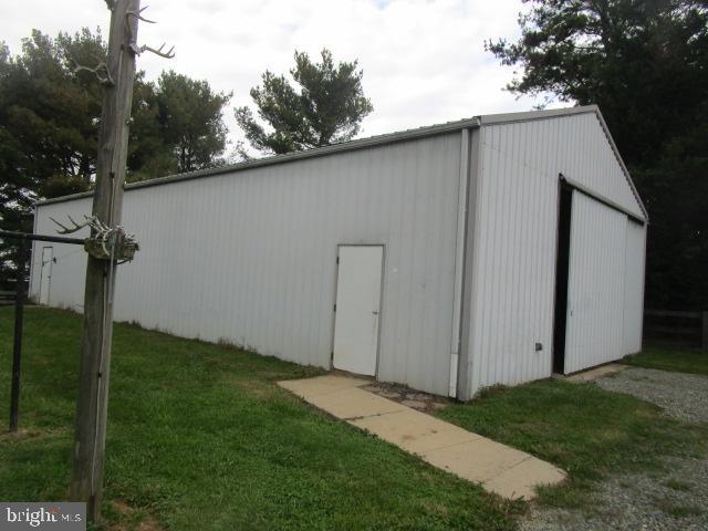1746 Hopewell Road Port Deposit, MD 21904 - Photo 3 of 24 a backyard of a house with lots of green space