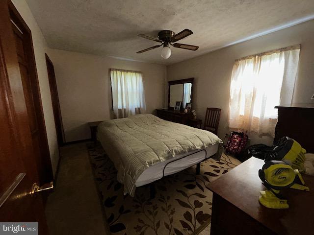 1746 Hopewell Road Port Deposit, MD 21904 - Photo 9 of 24 a bedroom with a bed and a window