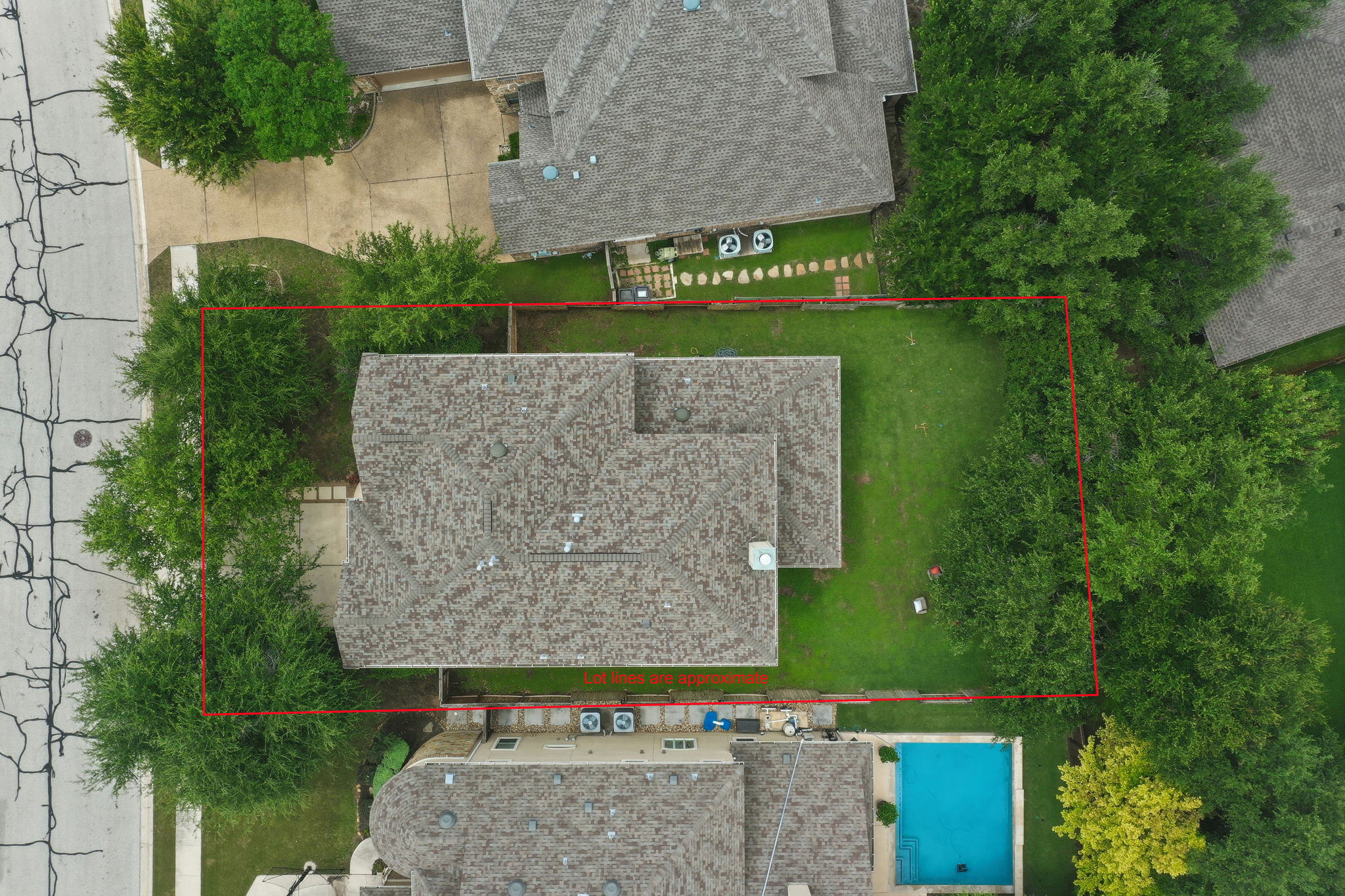 110 Dasher Drive Cedar Park, TX 78613 - Photo 31 of 39 An aerial perspective showcases the full property, outlined in red, complete with mature trees and a neatly kept lawn.