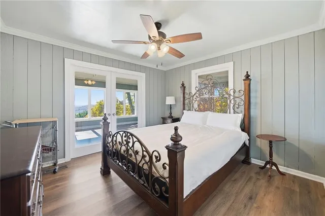 a white tub sitting in a bathroom