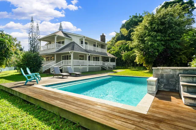 a view of a house with swimming pool