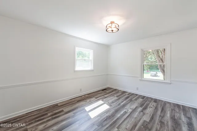 a view of a room that has a window in it