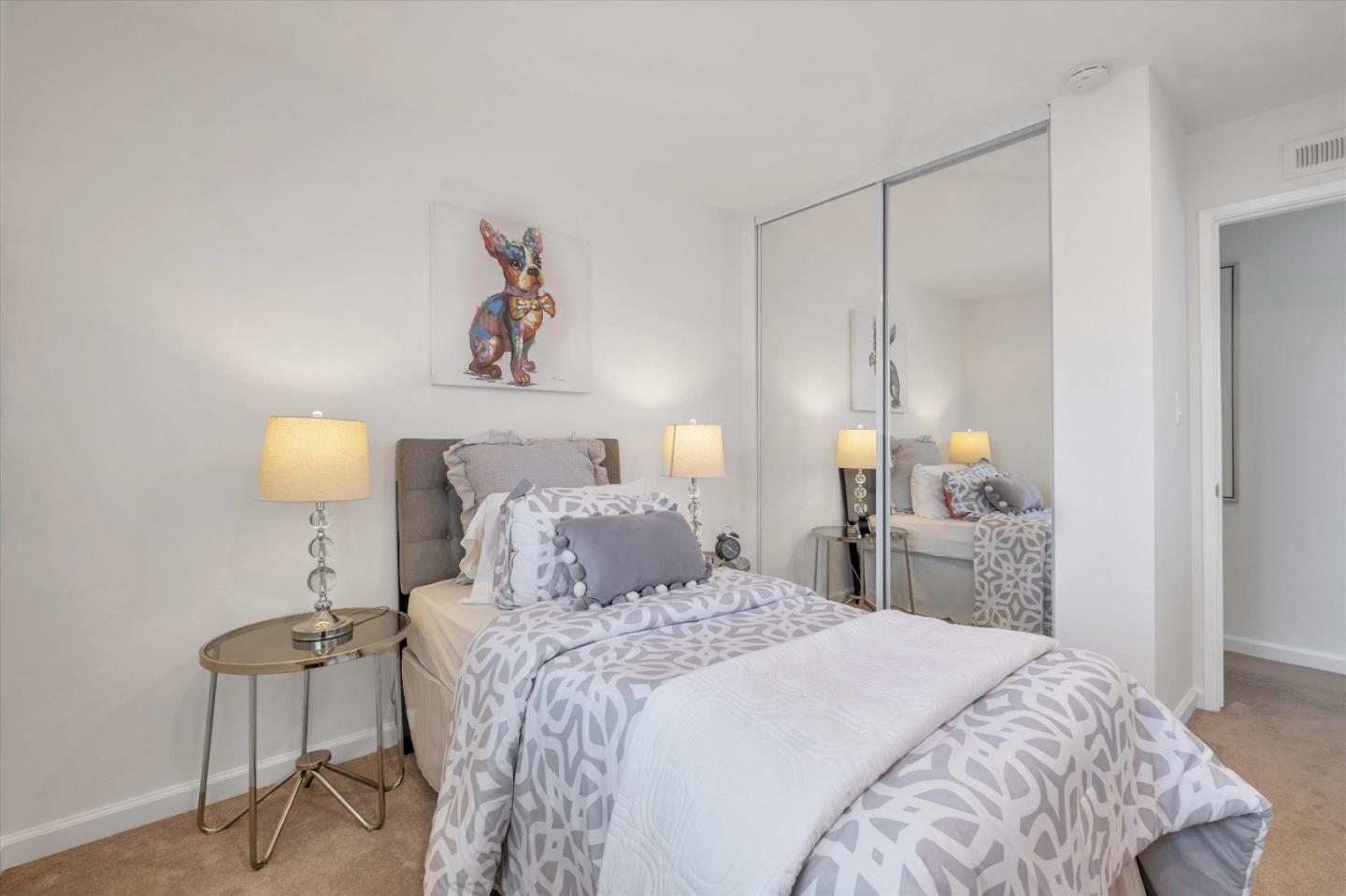 36286 Salisbury Drive Newark, CA 94560 - Photo 28 of 30 a bedroom with a bed and a lamp