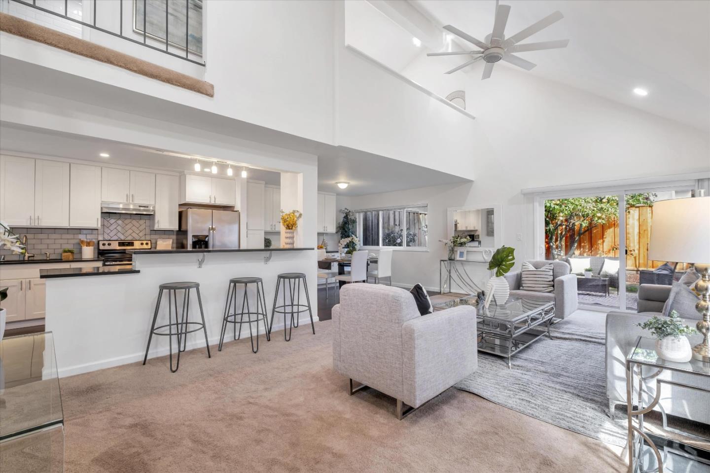 36286 Salisbury Drive Newark, CA 94560 - Photo 3 of 30 a living room with furniture and a large window with kitchen view