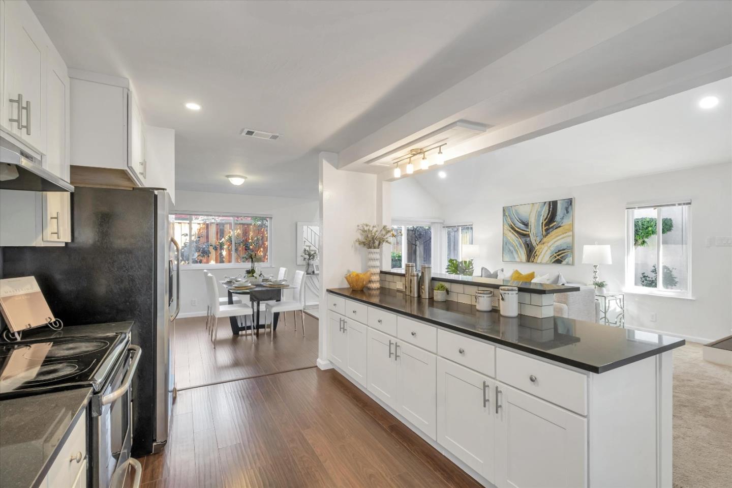 36286 Salisbury Drive Newark, CA 94560 - Photo 6 of 30 a large kitchen with a large counter top appliances and cabinets