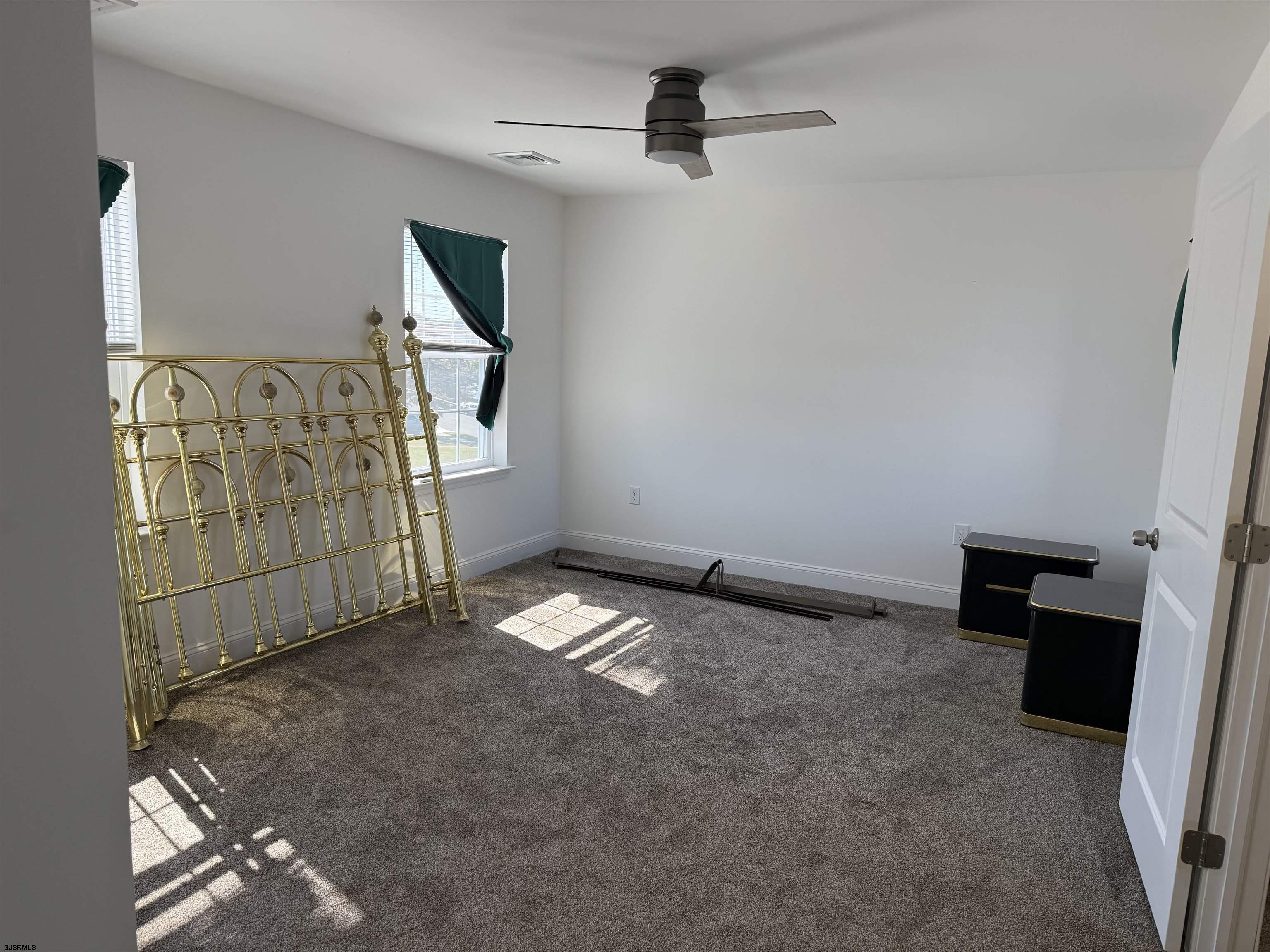 101 West Beach Avenue Brigantine, NJ 08203 - Photo 10 of 11 a view of empty room with fireplace