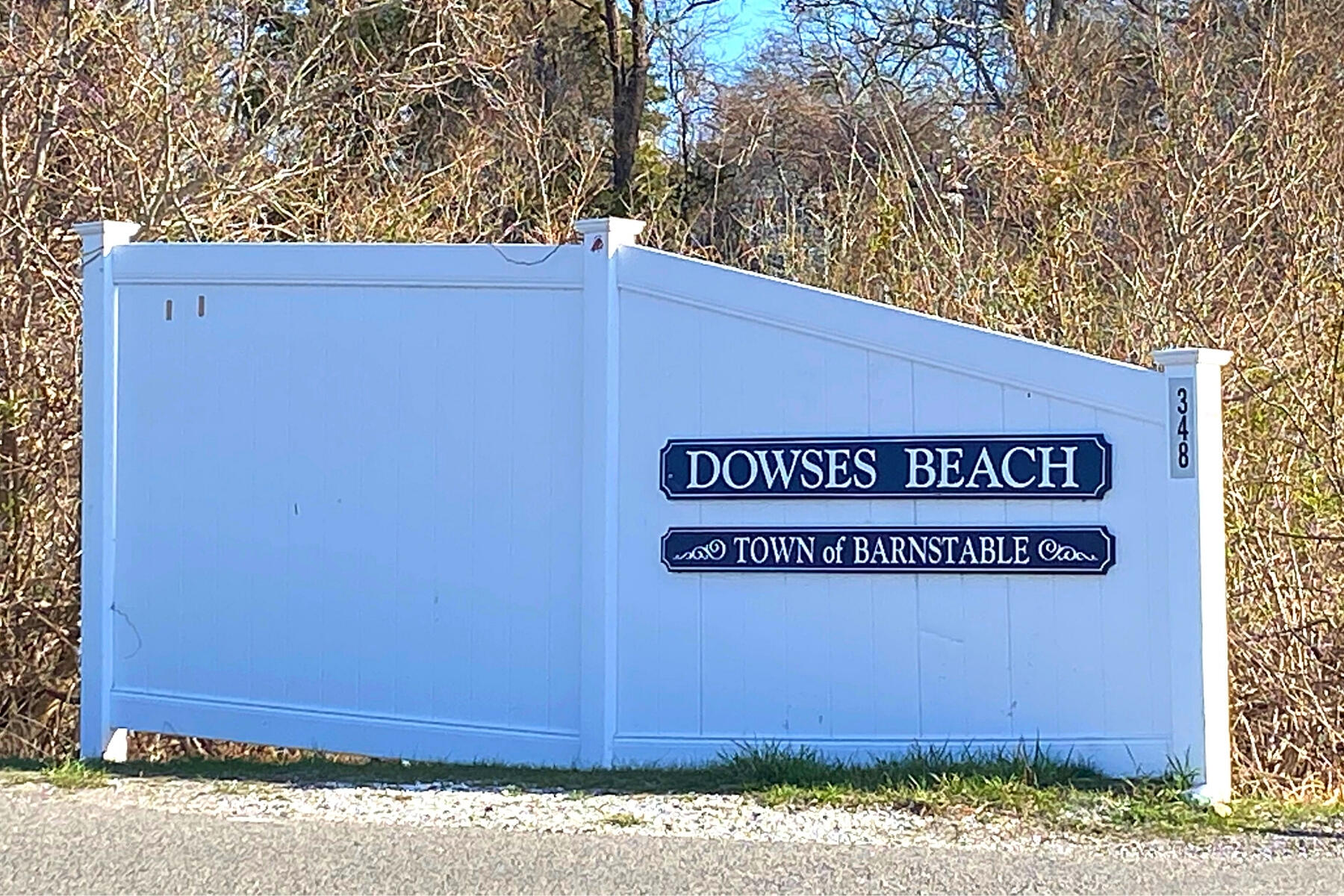 162 Main Street Osterville, MA 02655 - Photo 44 of 50 a sign on the side of a building
