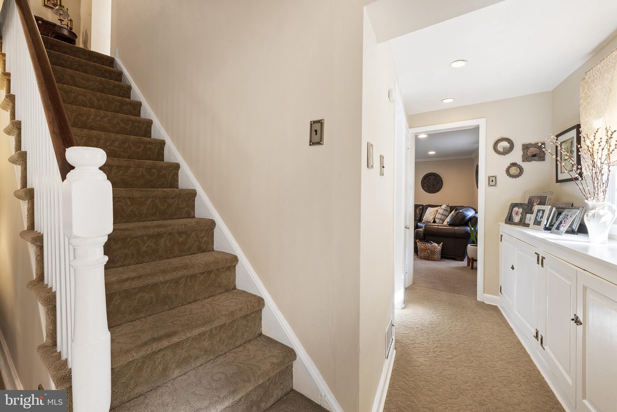 536 Drayton Road Oreland, PA 19075 - Photo 8 of 45 Inviting entryway with cozy staircase charm.