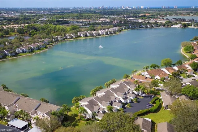 an aerial view of lake residential house with outdoor space