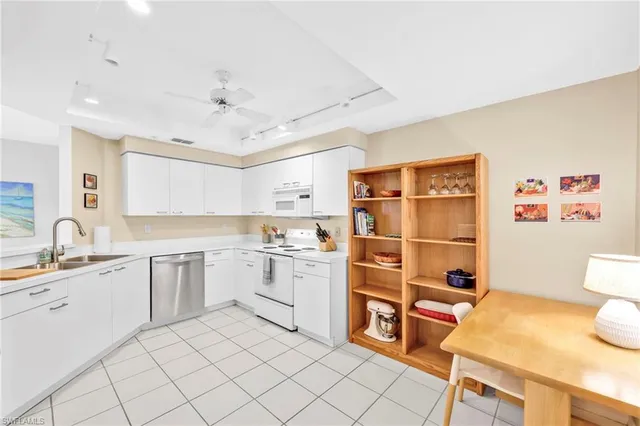 a kitchen with a cabinets and appliances