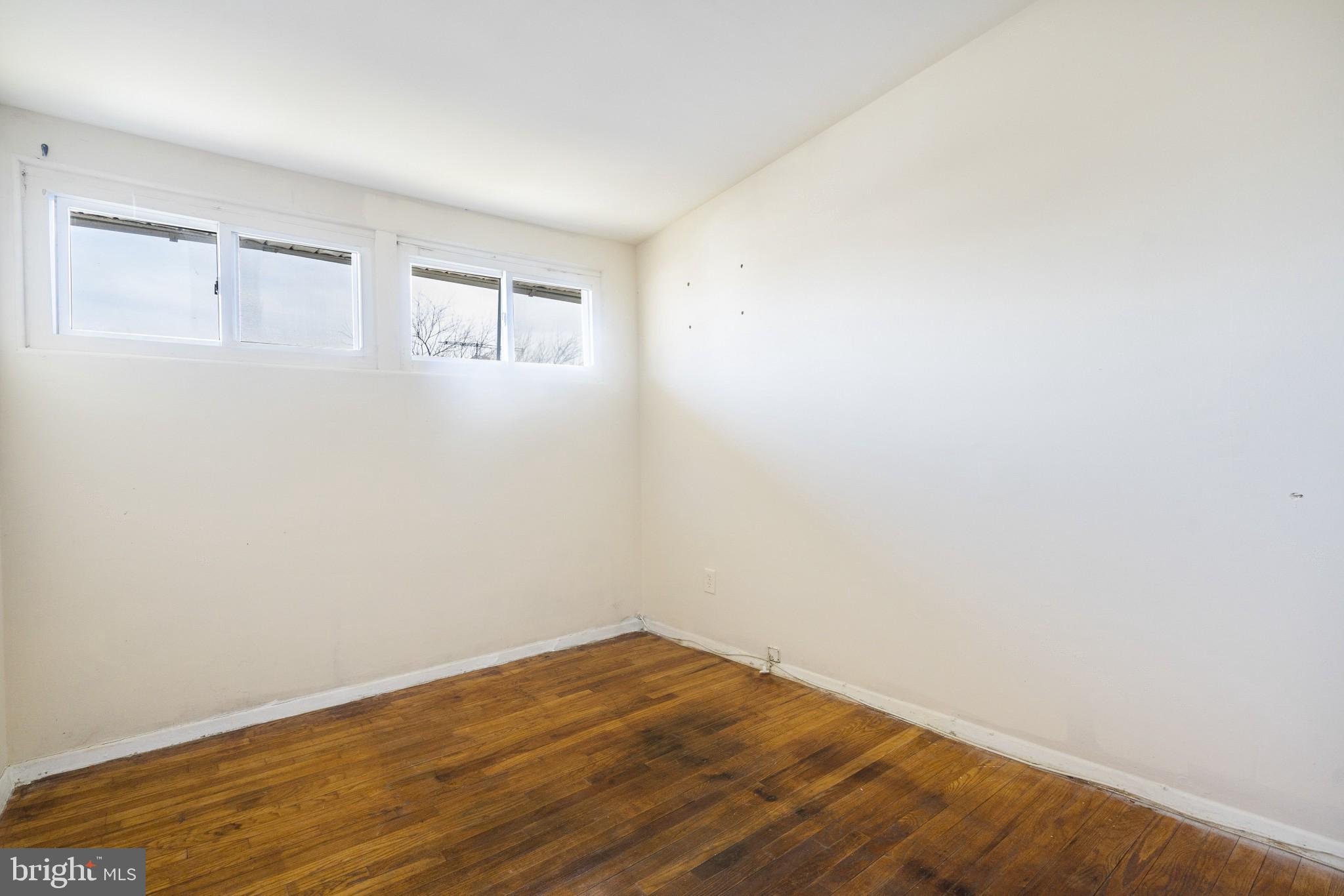 1059 Ruatan Street Silver Spring, MD 20903 - Photo 26 of 44 Main Level 3rd Bedroom Photo 2