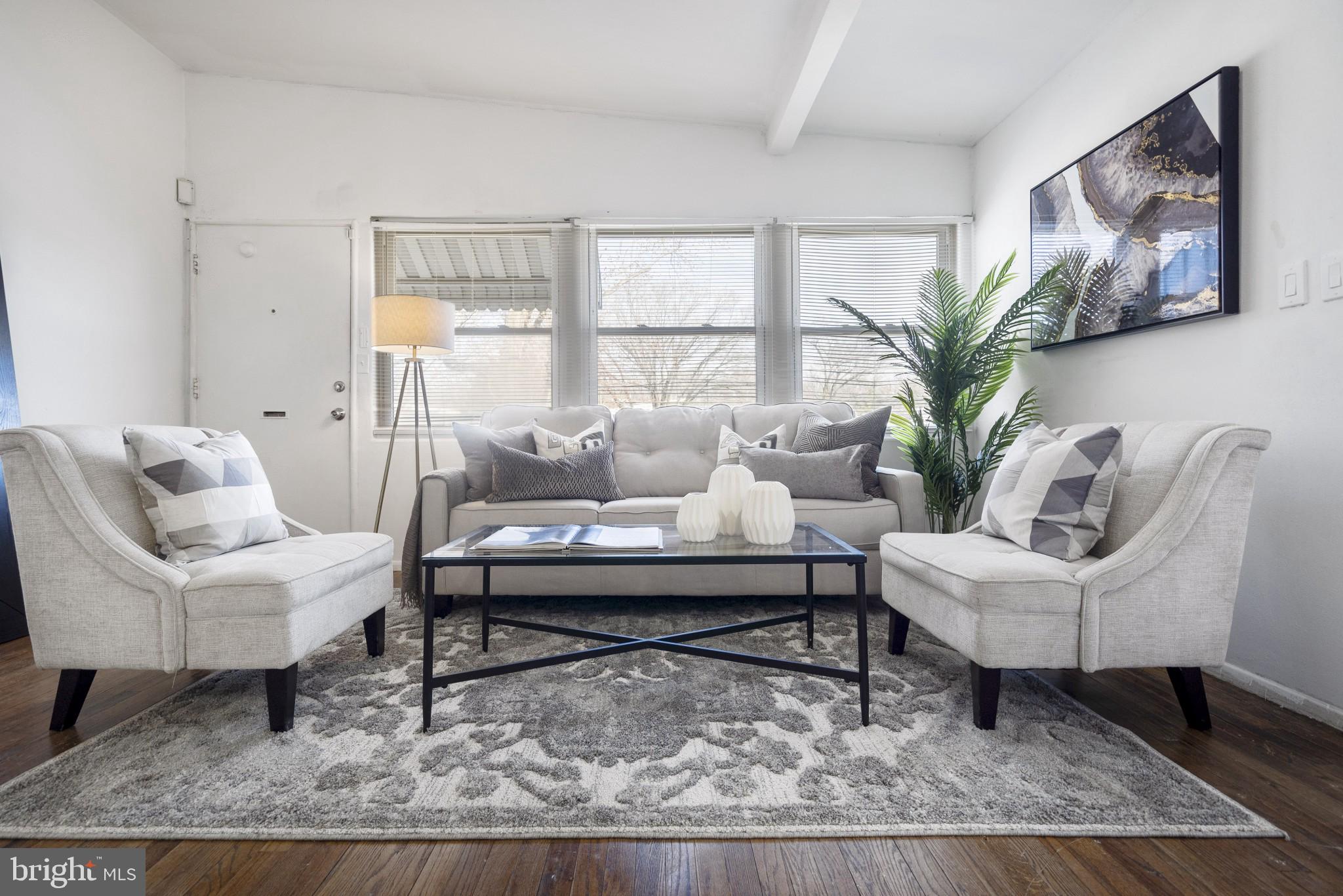 1059 Ruatan Street Silver Spring, MD 20903 - Photo 10 of 44 Main Level Living Room Area Photo 2