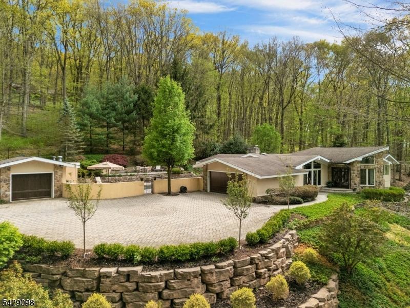 174 Bliss Road Mendham, NJ 07945 - Photo 1 of 49 a view of a patio with swimming pool