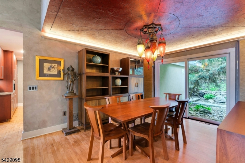 174 Bliss Road Mendham, NJ 07945 - Photo 13 of 49 a view of a dining room with furniture window and wooden floor