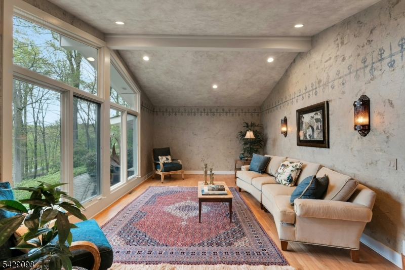 174 Bliss Road Mendham, NJ 07945 - Photo 17 of 49 a living room with furniture windows and a rug