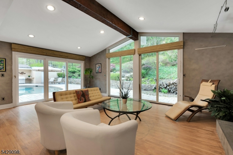 174 Bliss Road Mendham, NJ 07945 - Photo 22 of 49 a living room with furniture and a large window