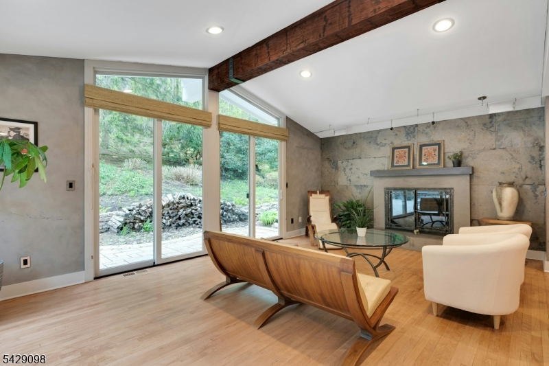 174 Bliss Road Mendham, NJ 07945 - Photo 23 of 49 a living room with furniture and a fireplace