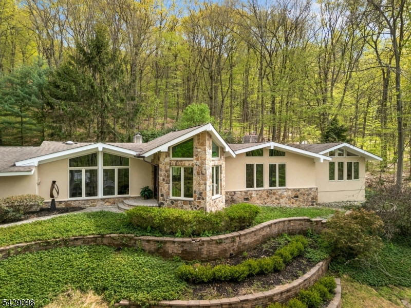 174 Bliss Road Mendham, NJ 07945 - Photo 3 of 49 a front view of a house with a yard