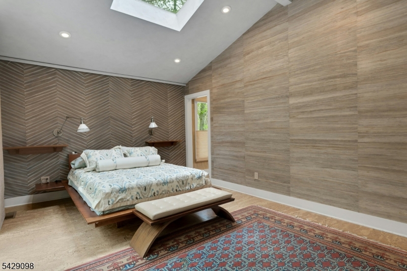 174 Bliss Road Mendham, NJ 07945 - Photo 33 of 49 a bedroom with a bed and a night stand