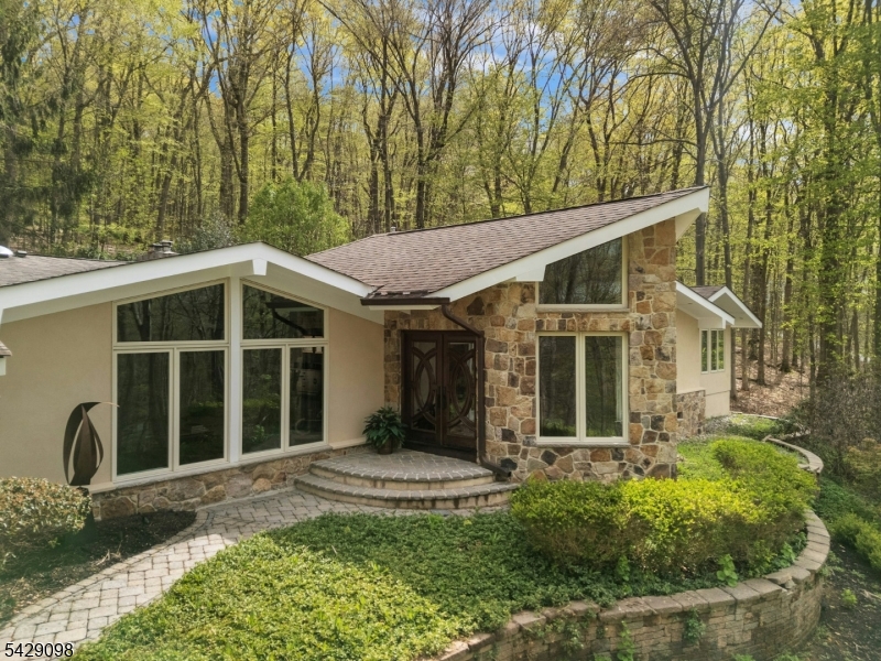 174 Bliss Road Mendham, NJ 07945 - Photo 4 of 49 a view of a house with a yard and potted plants