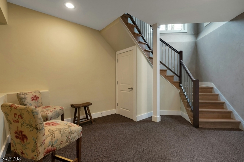 174 Bliss Road Mendham, NJ 07945 - Photo 45 of 49 a view of livingroom with furniture and stairs