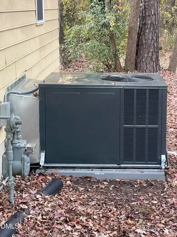 a view of a wooden door and a window