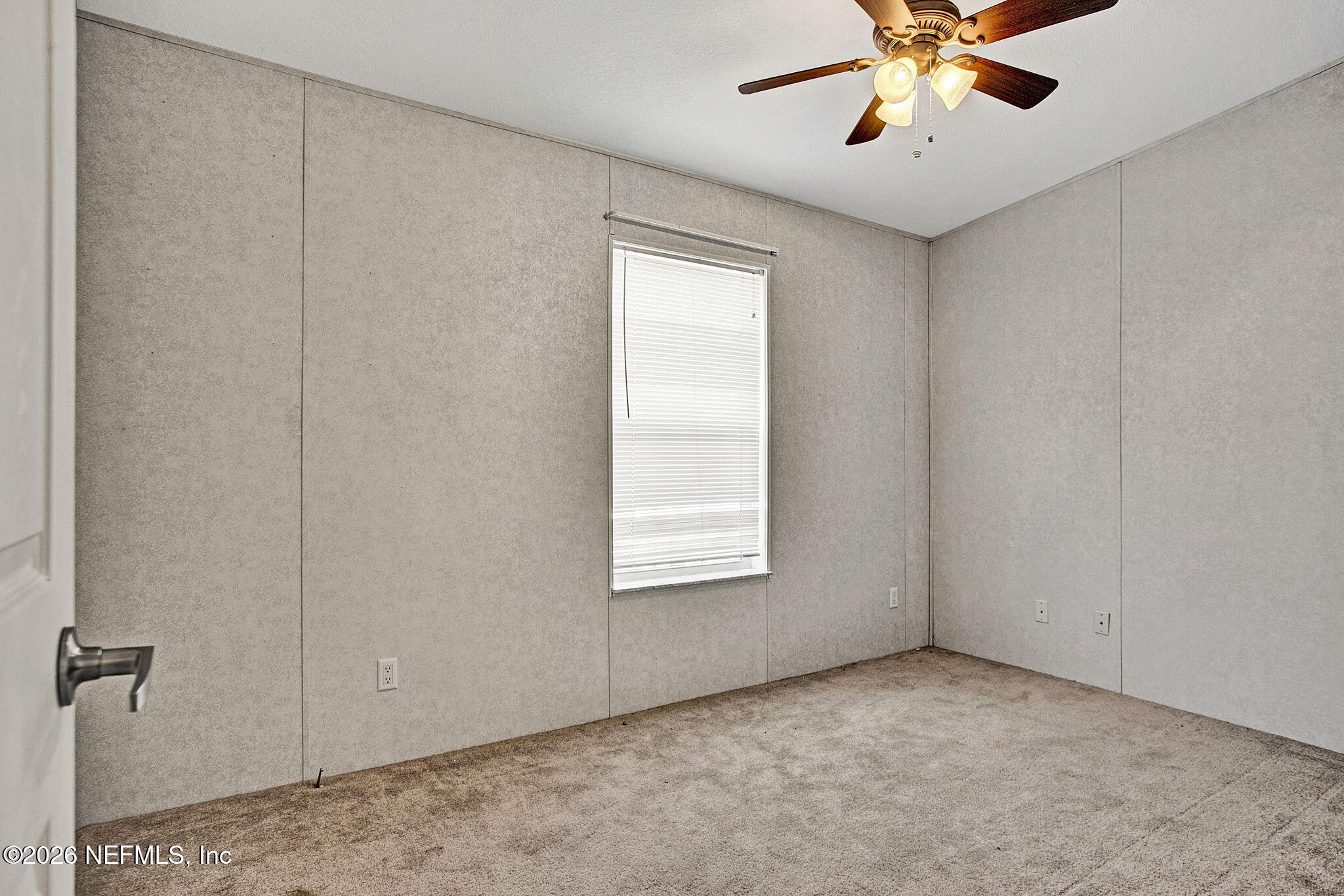 5891 Sequoia Road Keystone Heights, FL 32656 - Photo 12 of 29 a view of an empty room with a window