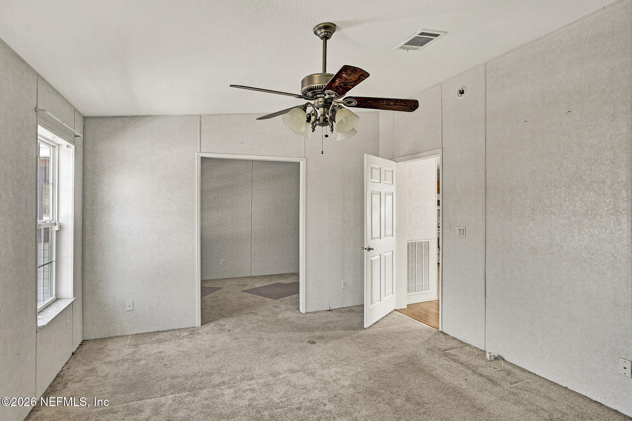 5891 Sequoia Road Keystone Heights, FL 32656 - Photo 16 of 29 a view of a chandelier fan