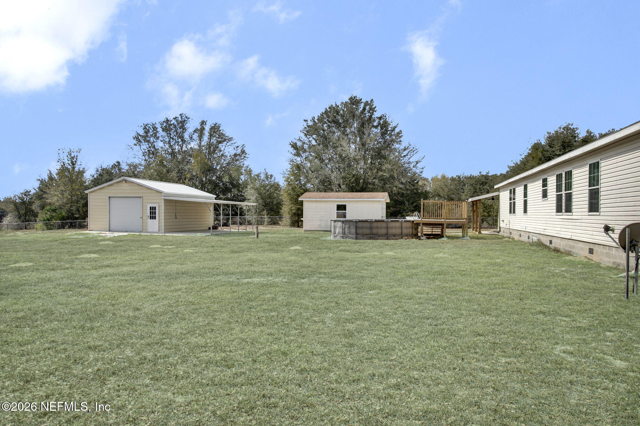 5891 Sequoia Road Keystone Heights, FL 32656 - Photo 22 of 29 a house view with a garden space