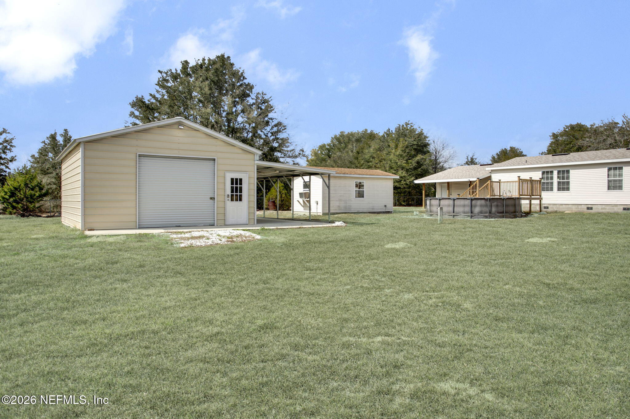5891 Sequoia Road Keystone Heights, FL 32656 - Photo 25 of 29 a house with yard in front of it