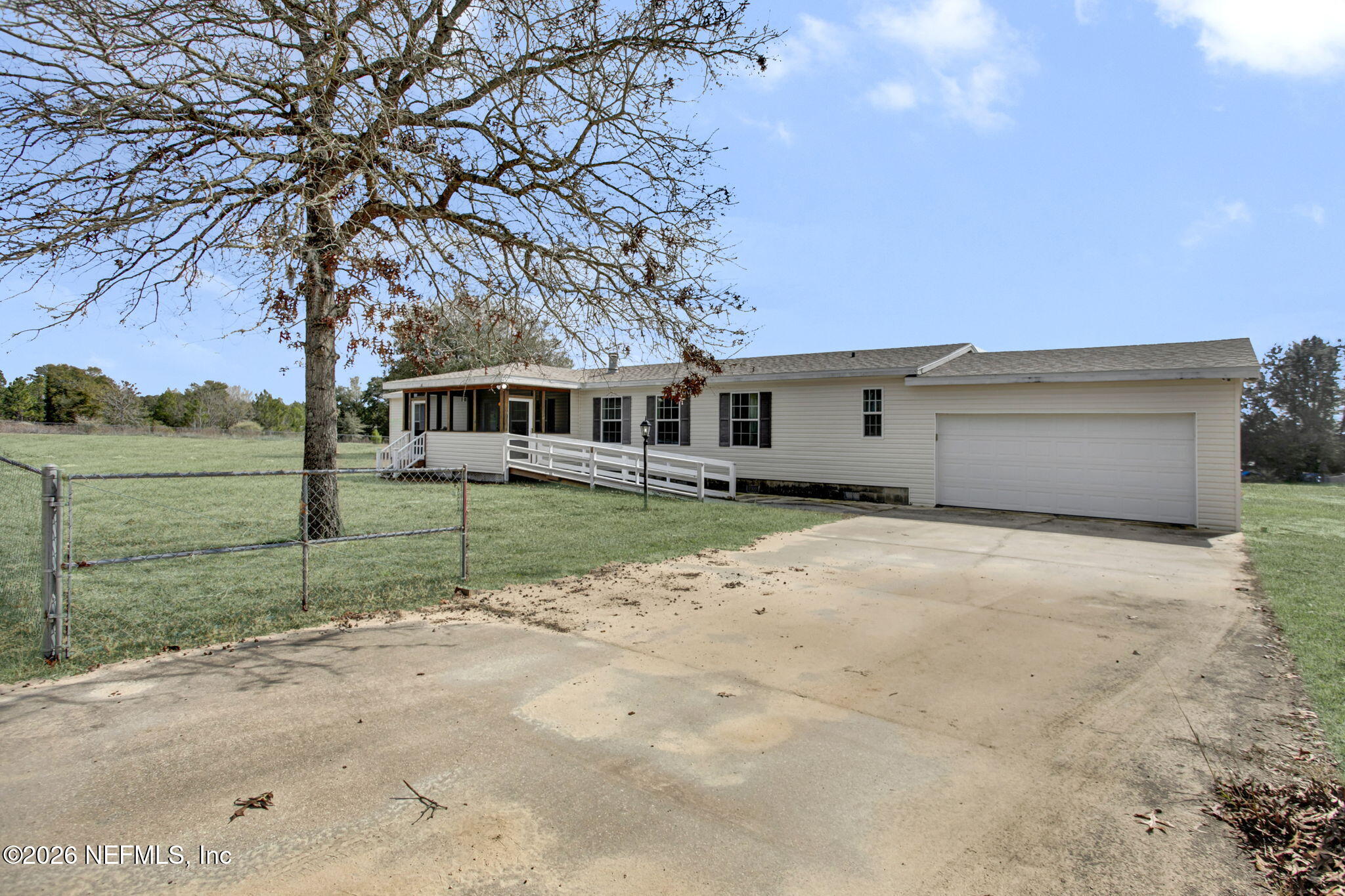 5891 Sequoia Road Keystone Heights, FL 32656 - Photo 26 of 29 front view of a house with a yard
