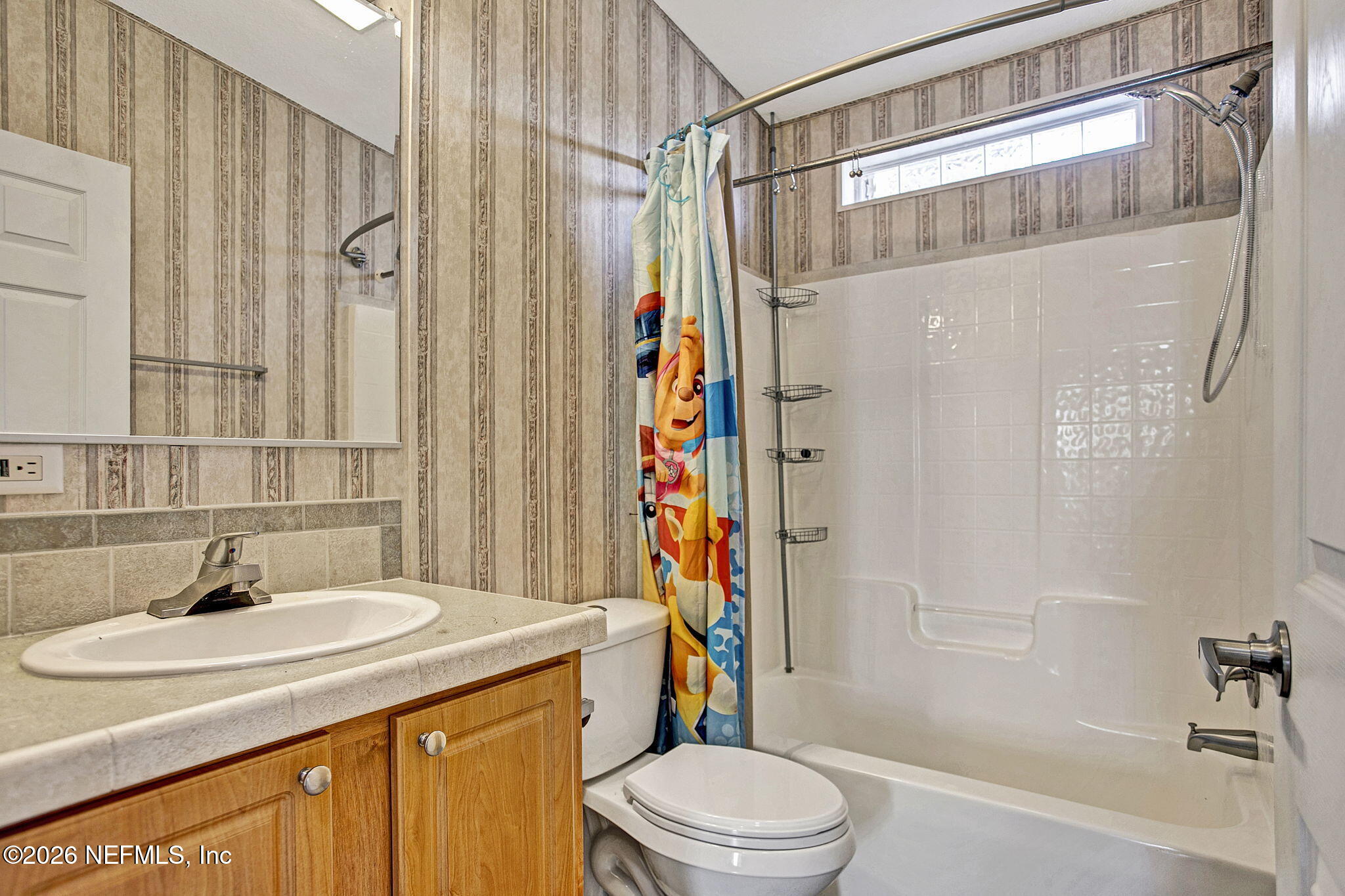 5891 Sequoia Road Keystone Heights, FL 32656 - Photo 10 of 29 a bathroom with a sink a toilet and shower
