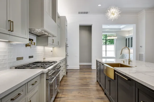 a view of a room with stairs and white walls