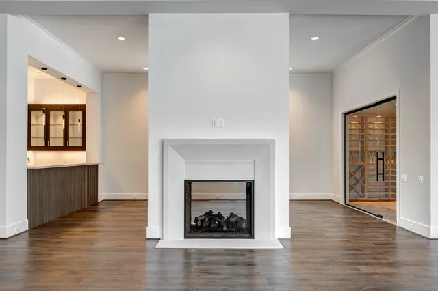 a kitchen with granite countertop a sink stove and cabinets