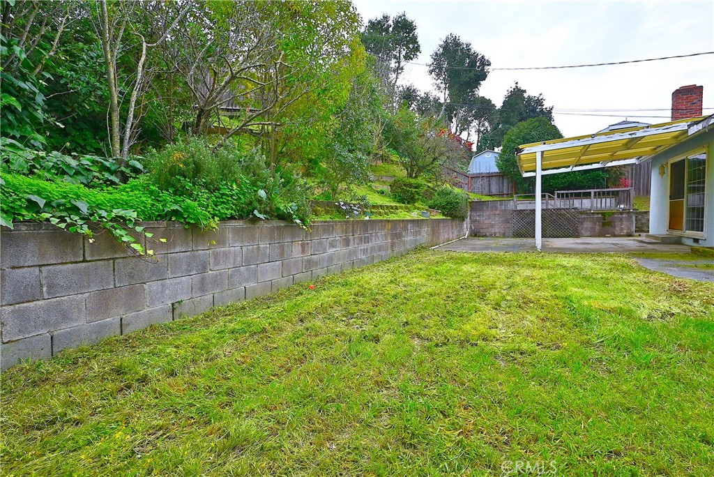 159 Coleridge Drive Vallejo, CA 94591 - Photo 20 of 23 a view of a backyard with table and chairs and wooden fence