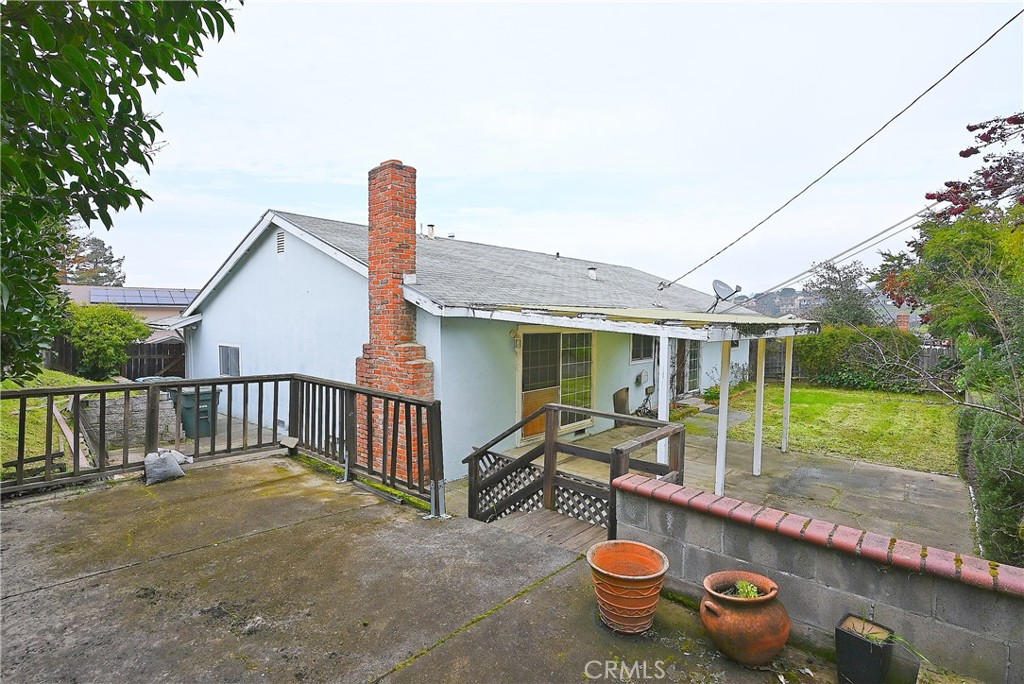 159 Coleridge Drive Vallejo, CA 94591 - Photo 23 of 23 a view of a chair and table in backyard of the house