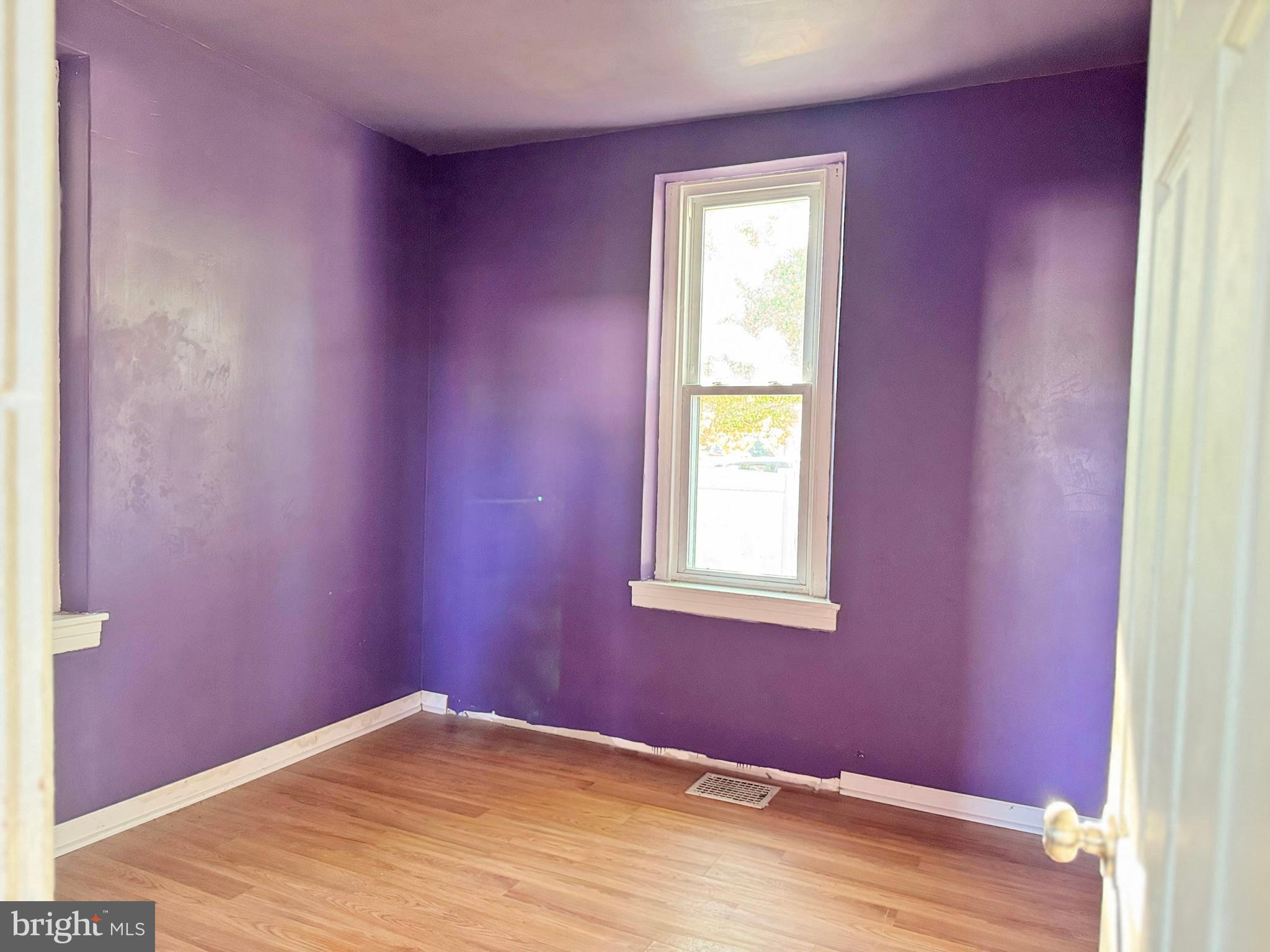 524 8th Avenue Lindenwold, NJ 08021 - Photo 11 of 19 a view of empty room with window and wooden floor