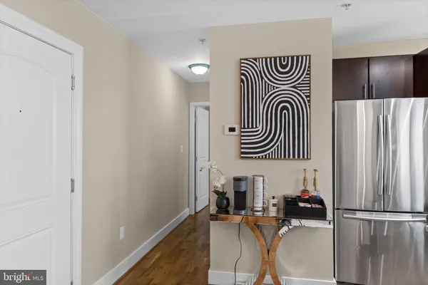 a view of a hallway with seating area