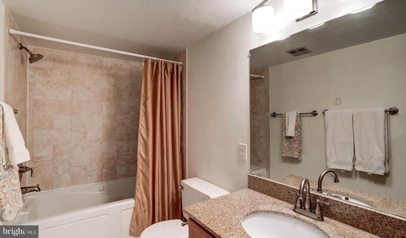 1413 Northgate Square, Unit 11C Reston, VA 20190 - Photo 18 of 23 2nd Bathroom