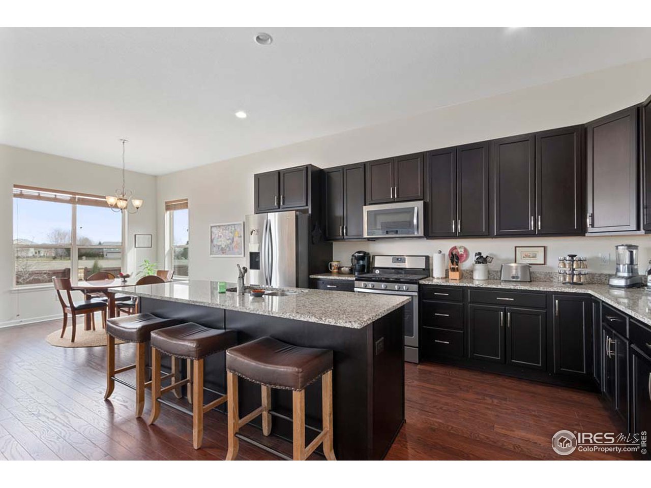 2962 Zephyr Road Fort Collins, CO 80528 - Photo 8 of 25 Wood Flooring in Kitchen