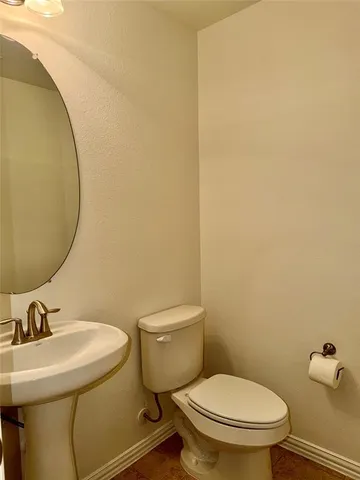 an empty room with a empty space and a ceiling fan