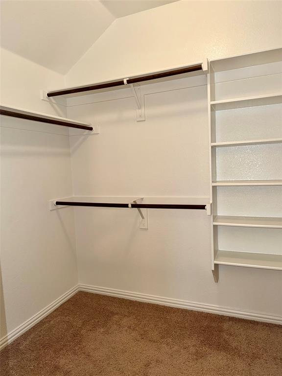 1308 Hudson Lane Prosper, TX 75078 - Photo 15 of 17 a view of a room with racks on the wall