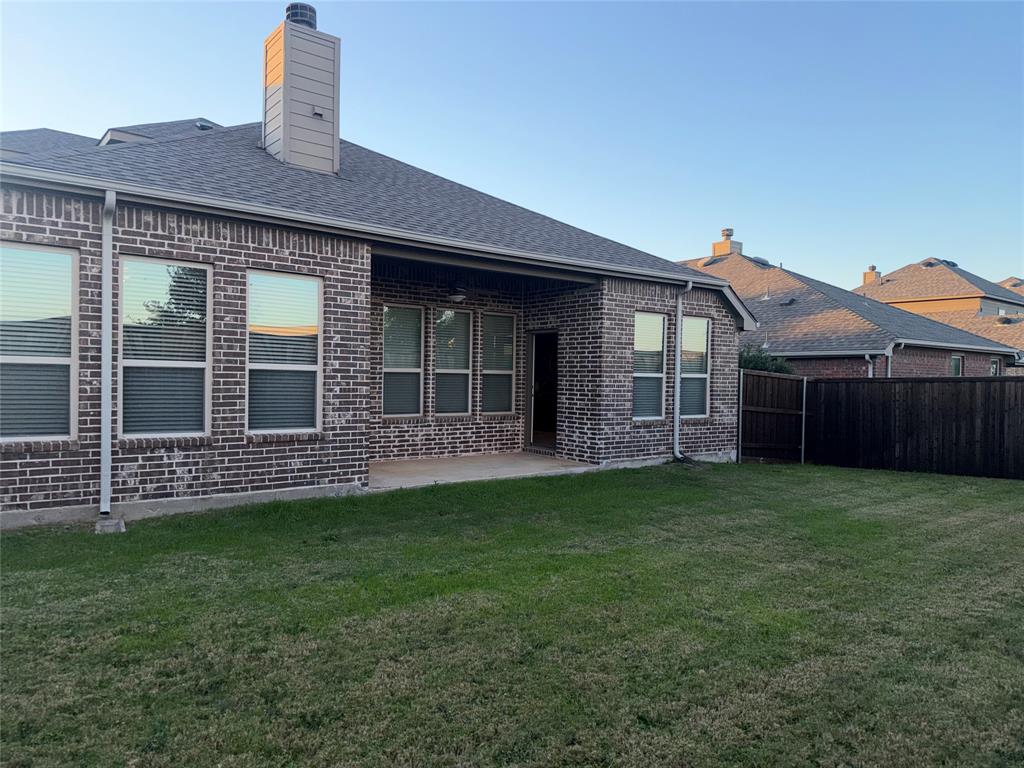 1308 Hudson Lane Prosper, TX 75078 - Photo 16 of 17 a front view of a house with a garden