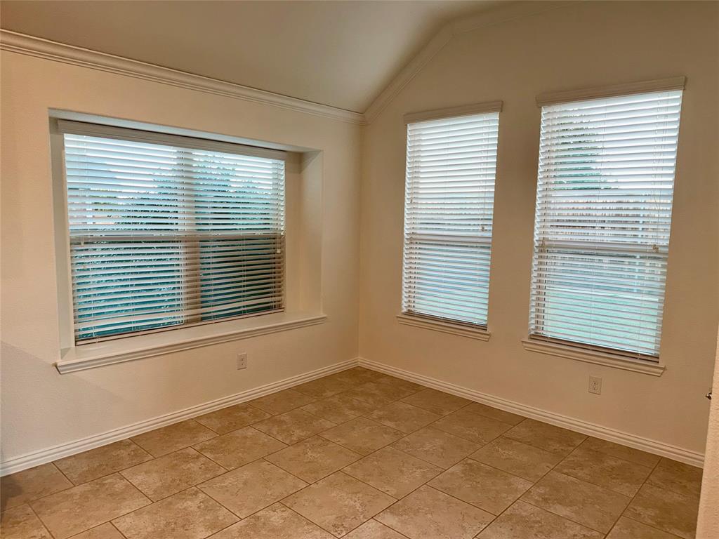 1308 Hudson Lane Prosper, TX 75078 - Photo 6 of 17 a view of an empty room with a window