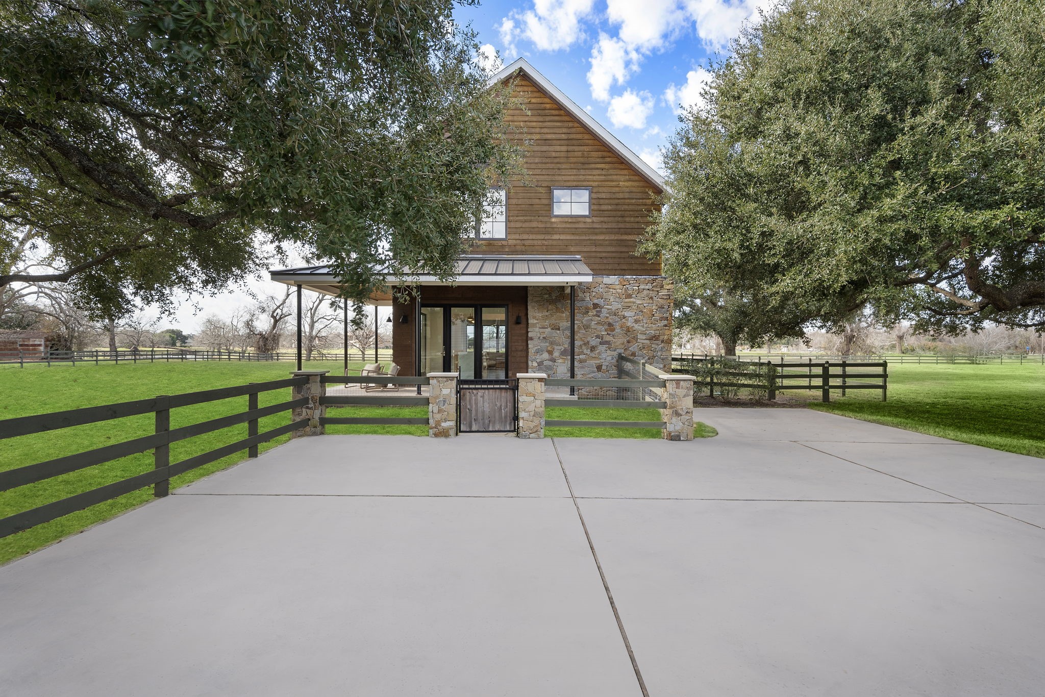 5511 Fulbrook Road Fulshear, TX 77441 - Photo 40 of 50 Property includes a gorgeous 2 story Casita with 1,565 sq ft of space separated into an entertaining bar, dining room, living room, dedicated kitchen, downstairs bathroom, upstairs bedroom, and upstairs bathroom.